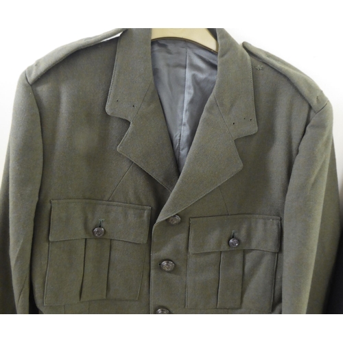 101 - Vintage British and foreign military uniform tunics and jackets; and an Artillery Mess suit(Please N... 