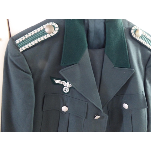 107 - Mainly vintage foreign military uniforms and associated clothing: to include tunics(Please Note: thi... 