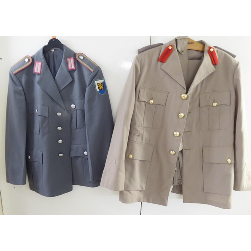 107 - Mainly vintage foreign military uniforms and associated clothing: to include tunics(Please Note: thi... 