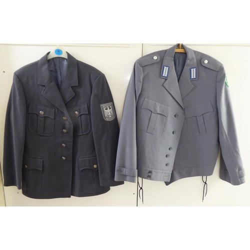 107 - Mainly vintage foreign military uniforms and associated clothing: to include tunics(Please Note: thi... 