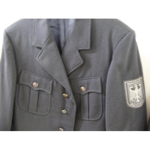 107 - Mainly vintage foreign military uniforms and associated clothing: to include tunics(Please Note: thi... 