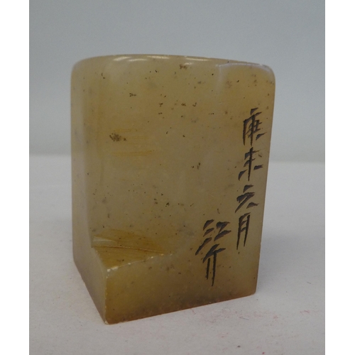 114 - Chinese artefacts, comprising an inkstone, in a hardwood stand with a cover  5