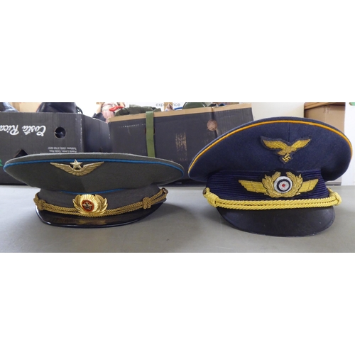 116 - Six various foreign military and military style peaked caps(Please Note: this lot is subject to the ... 