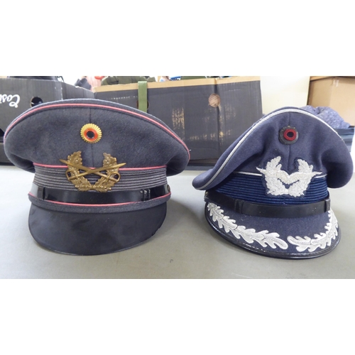 116 - Six various foreign military and military style peaked caps(Please Note: this lot is subject to the ... 