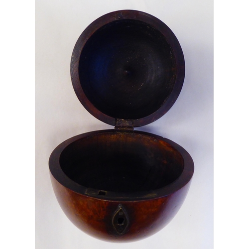 128 - A 19thC turned treen tea caddy in the form of an apple with a lockable, hinged lid  5.25