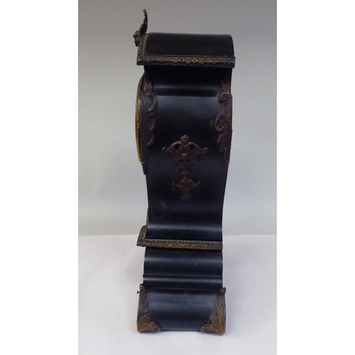 129 - A late 19thC French black lacquered and boulleworked oak cased balloon shape mantel timepiece with a... 