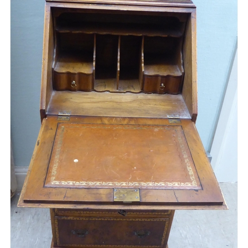 138 - A modern lady's Queen Anne inspired yewwood finished and string inlaid walnut bureau, the upper part... 