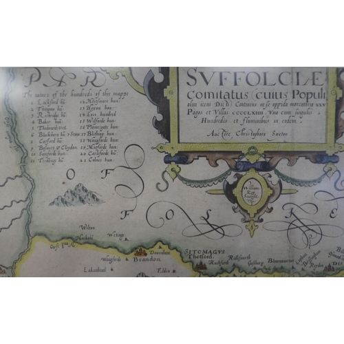 140 - A 17thC Christopher Saxton coloured map 'Svffolclae' incorporating a title cartouche, compass and sc... 