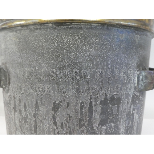 144 - A 19thC Wellswood Dairy oval galvanised iron and brass milk churn with flank handles and swing handl... 