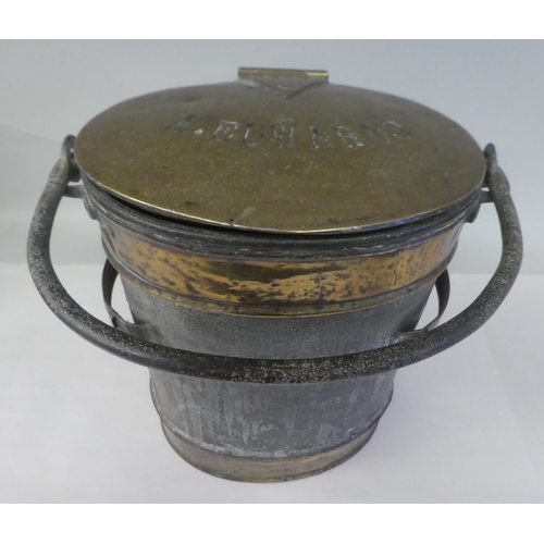 144 - A 19thC Wellswood Dairy oval galvanised iron and brass milk churn with flank handles and swing handl... 