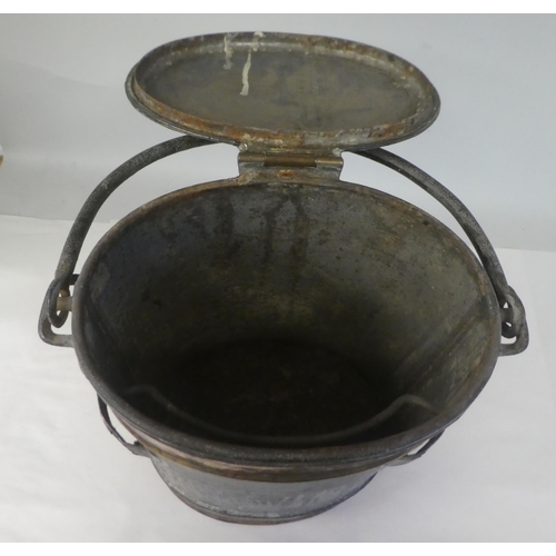 144 - A 19thC Wellswood Dairy oval galvanised iron and brass milk churn with flank handles and swing handl... 