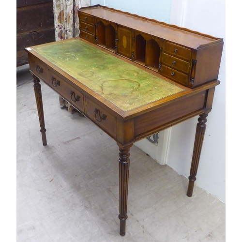 148 - A modern Victorian style mahogany satinwood inlaid bonheur du' jour, the superstructure with drawers... 