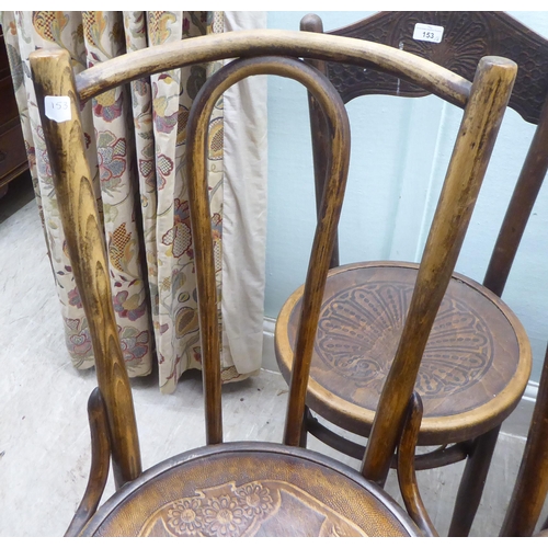 153 - A set of three early 20thC Mundis bentwood chairs with solid, stencilled seats; and two similar pair... 