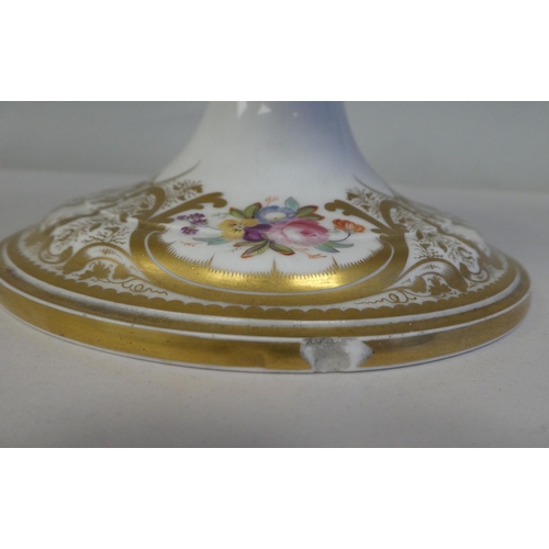 154 - A late 19thC floral painted and gilded china three tier stand, on a circular base  16