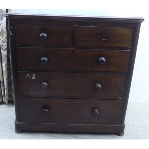 168 - A late Victorian mahogany dressing chest, the two short/three long drawers with bun handles  42... 