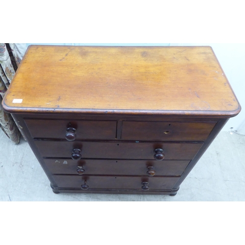 168 - A late Victorian mahogany dressing chest, the two short/three long drawers with bun handles  42... 