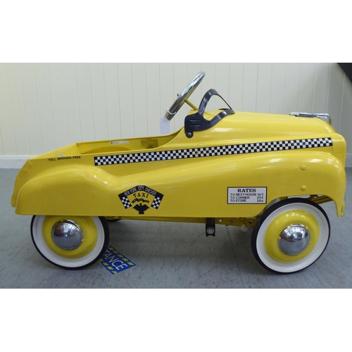 17 - A Burns model pedal car, in the form of a New York yellow cab with rubber wheels  33