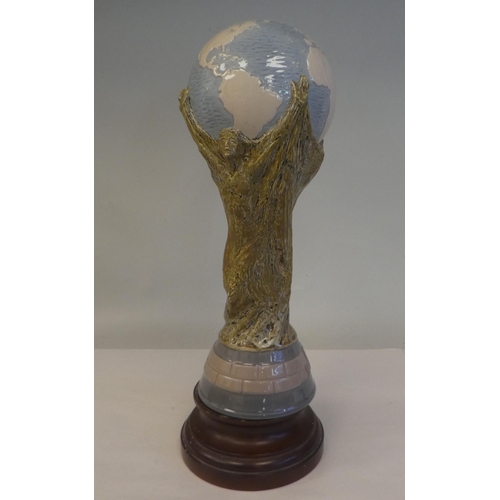 170 - A Lladro porcelain model, a football World Cup trophy, on an associated plinth  15