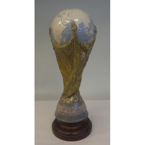 170 - A Lladro porcelain model, a football World Cup trophy, on an associated plinth  15