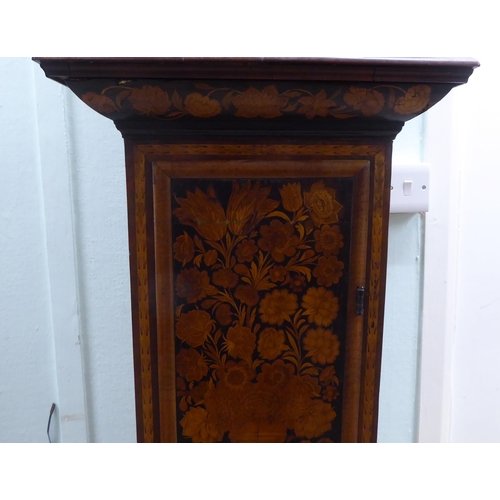 171 - A late 18thC walnut figured mahogany and marquetry longcase clock; the hood with a straight top and ... 