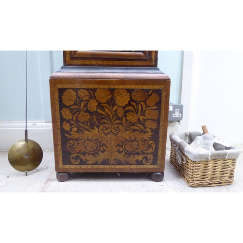 171 - A late 18thC walnut figured mahogany and marquetry longcase clock; the hood with a straight top and ... 