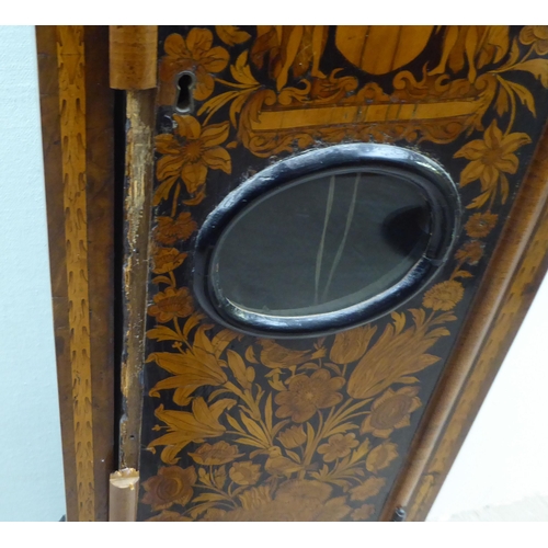 171 - A late 18thC walnut figured mahogany and marquetry longcase clock; the hood with a straight top and ... 