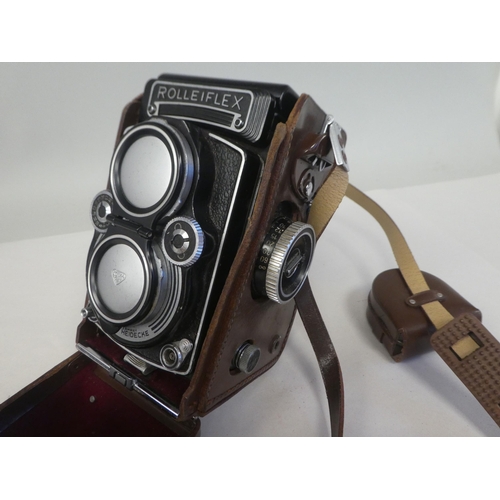 174 - A Franke & Heidecke Rolleiflex camera, in a stitched and moulded brown hide case 