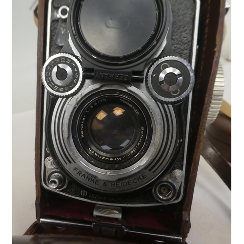 174 - A Franke & Heidecke Rolleiflex camera, in a stitched and moulded brown hide case 