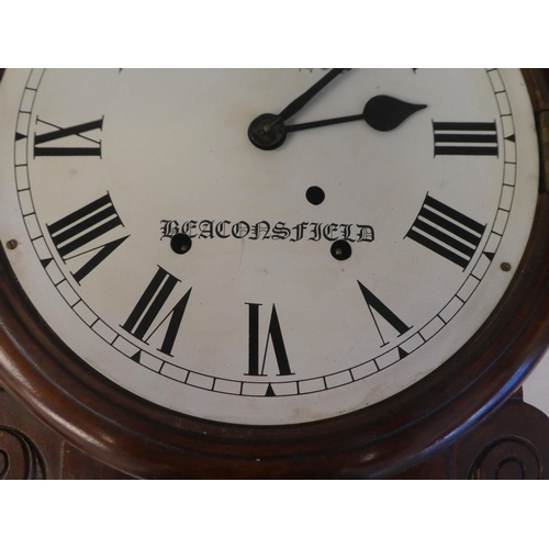 175 - A late 19thC and later mahogany cased drop-dial wall clock with a turned surround and pendulum windo... 