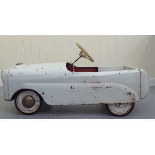 18 - A vintage American style pedal car, in white livery with rubber wheels  33