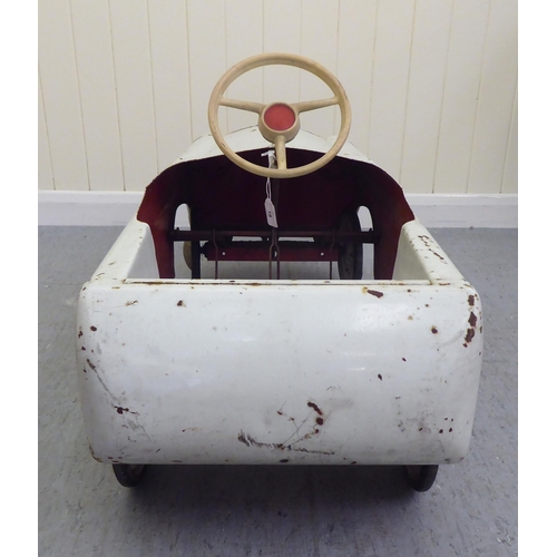 18 - A vintage American style pedal car, in white livery with rubber wheels  33