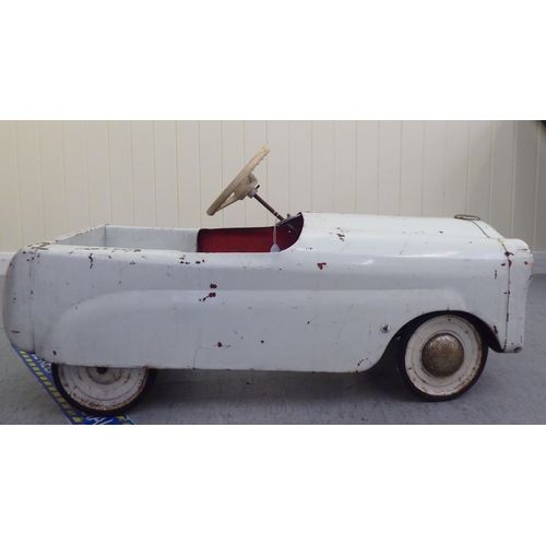 18 - A vintage American style pedal car, in white livery with rubber wheels  33