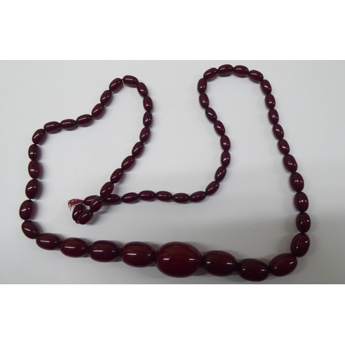 181 - A cherry amber coloured graduated bead necklace 