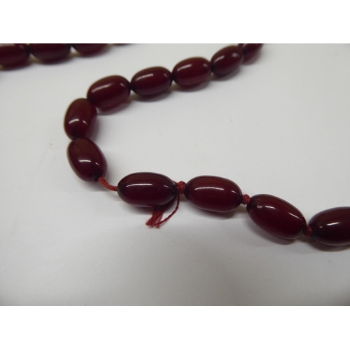 181 - A cherry amber coloured graduated bead necklace 