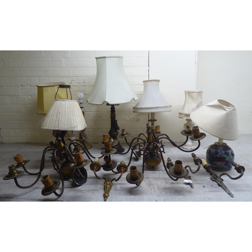 182 - Mainly 20thC interior lighting: to include a pair of Dutch design brass centre lights  22