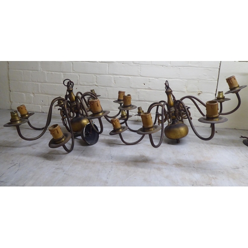 182 - Mainly 20thC interior lighting: to include a pair of Dutch design brass centre lights  22