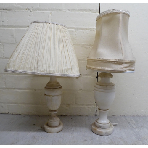 182 - Mainly 20thC interior lighting: to include a pair of Dutch design brass centre lights  22