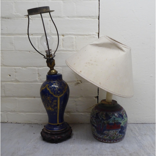 182 - Mainly 20thC interior lighting: to include a pair of Dutch design brass centre lights  22