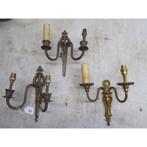 182 - Mainly 20thC interior lighting: to include a pair of Dutch design brass centre lights  22