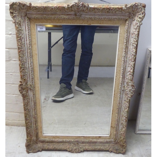 205 - Six dissimilar early 20thC variously framed mirrors  largest 16