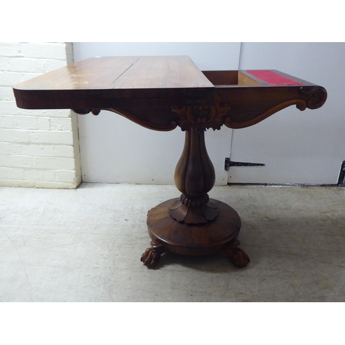 209 - A William IV rosewood card table, the rotating foldover top raised on a bulbous, reeded, pedestal, o... 