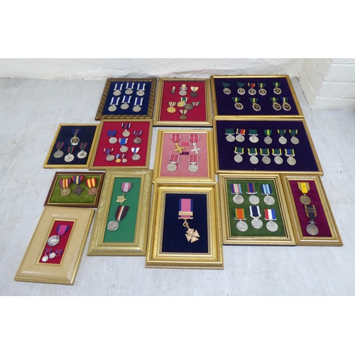 226 - Framed presentation sets of replica medals, some in silver (Please Note: this lot is subject to the ... 