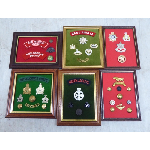 228 - Variously themed replica medals and badges, on presentation fabric backed display boards (Please Not... 