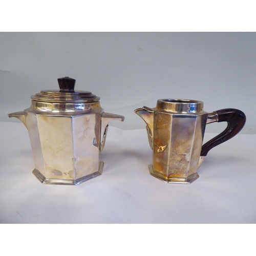 23 - An Art Deco period Continental (possibly French) four piece silver coloured metal coffee set of octa... 