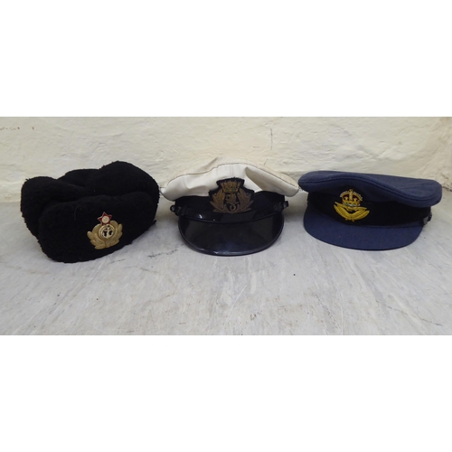 230 - Hats: to include military helmets, peaked caps and berets(Please Note: this lot is subject to the st... 