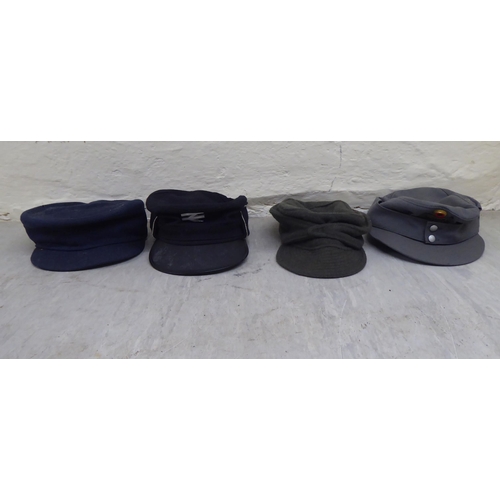 230 - Hats: to include military helmets, peaked caps and berets(Please Note: this lot is subject to the st... 