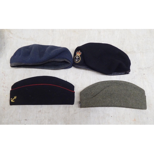 230 - Hats: to include military helmets, peaked caps and berets(Please Note: this lot is subject to the st... 