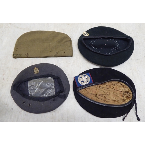 230 - Hats: to include military helmets, peaked caps and berets(Please Note: this lot is subject to the st... 