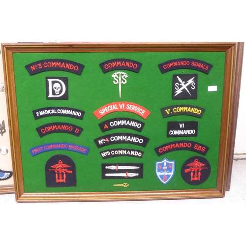 232 - Five framed displays of replica medals and fabric badges (Please Note: this lot is subject to the st... 