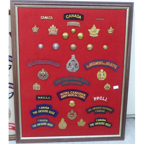 232 - Five framed displays of replica medals and fabric badges (Please Note: this lot is subject to the st... 